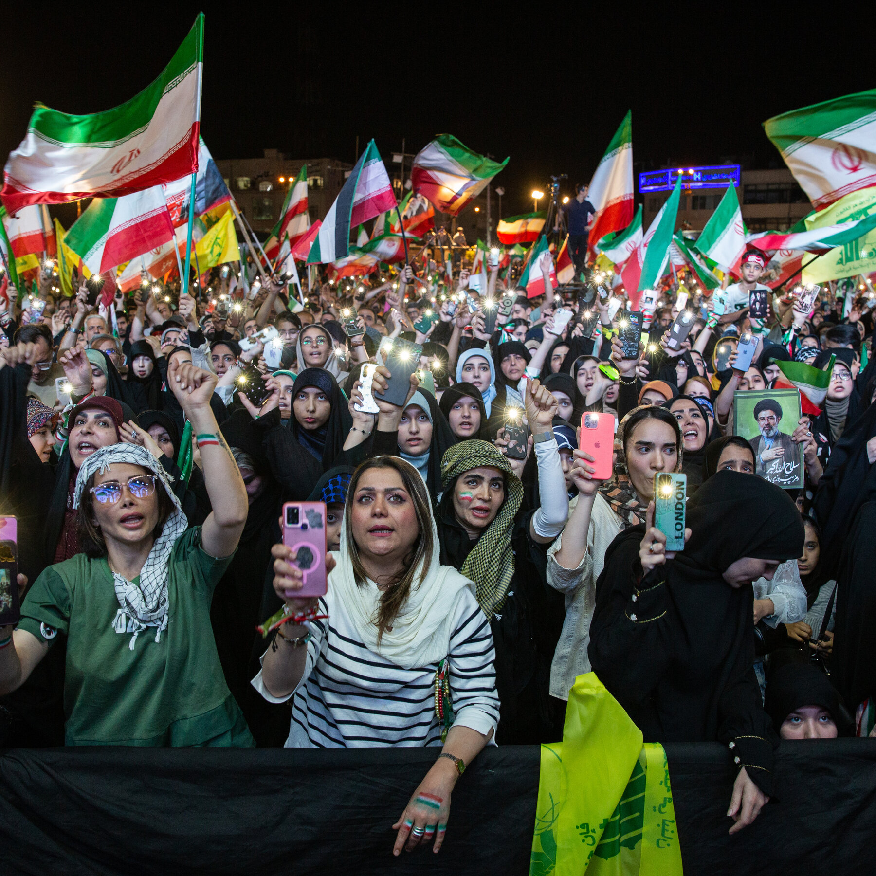 Iranian loyalists forge alliances with former dissidents, including unveiled women